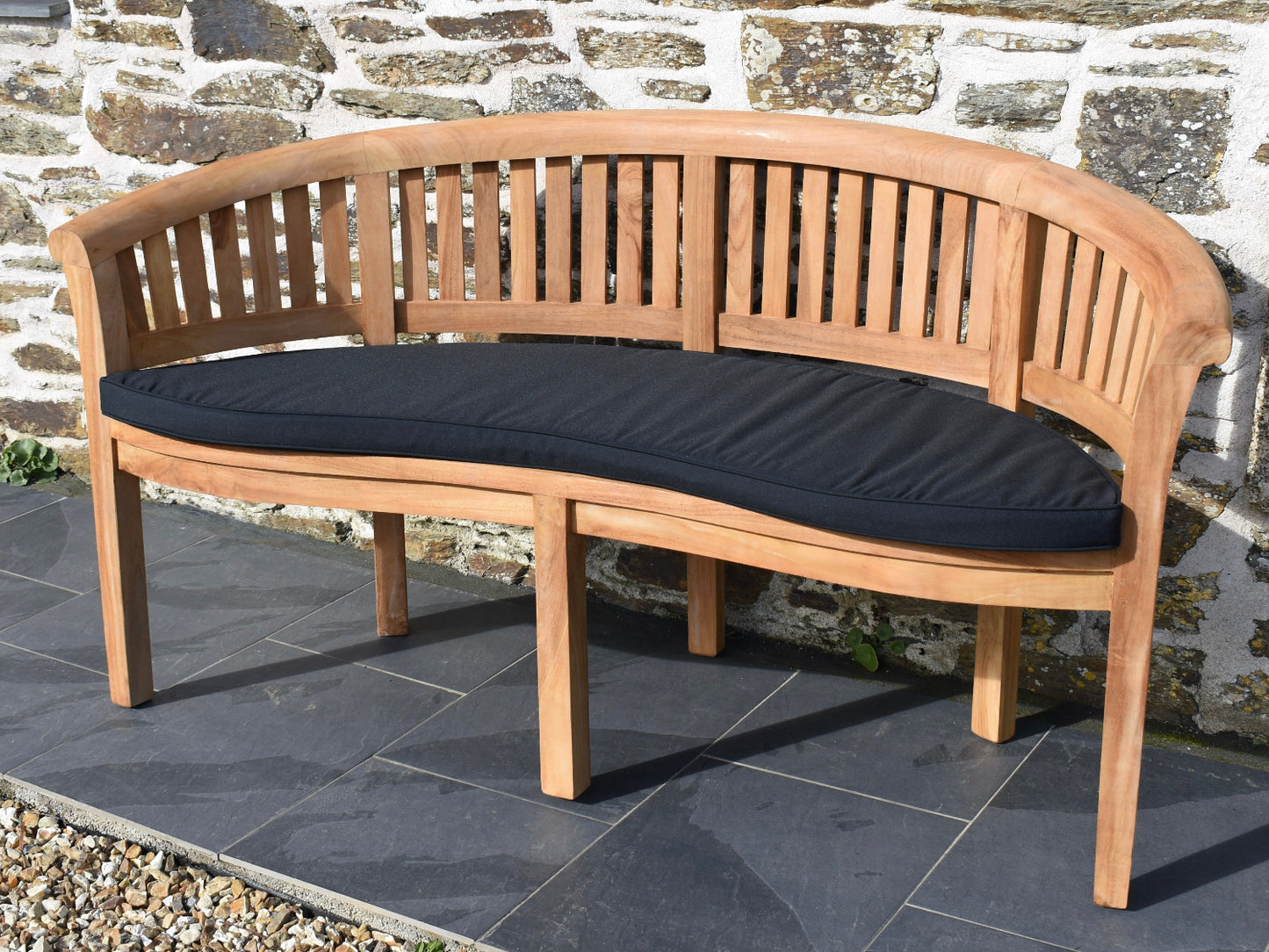 black outdoor cushion for curved banana garden bench with removable, machine washable covers