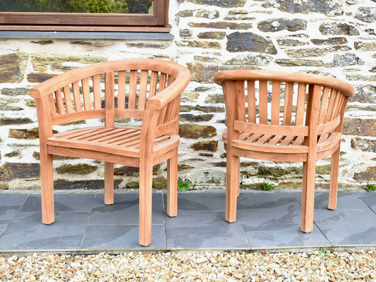 Classic teak garden curved armchair to match a banana bench. Image shows front and back detail of chair