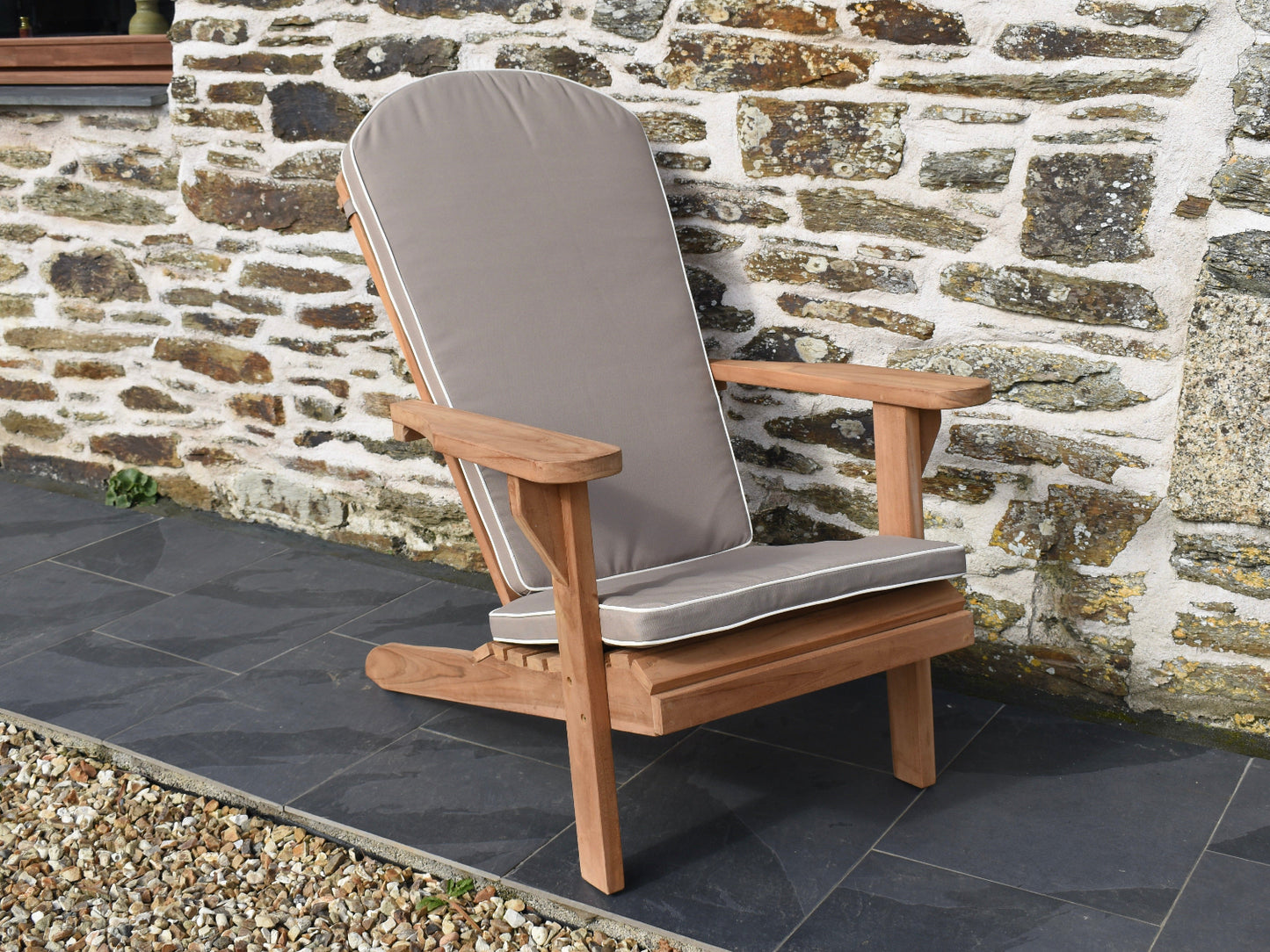 soft taupe colour luxury cushion for an Adirondack outdoor chair featuring contrast white piping and removable, machine washable cover