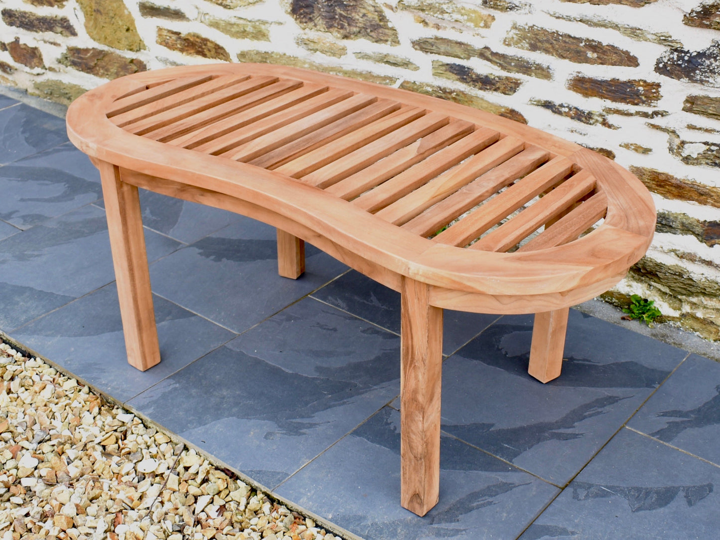solid teak coffee table with spaced slatted top to match our traditional teak banana bench