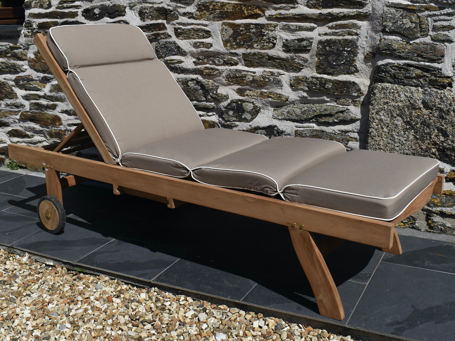 Luxury taupe colour traditional outdoor cushion for a garden sun lounger chair