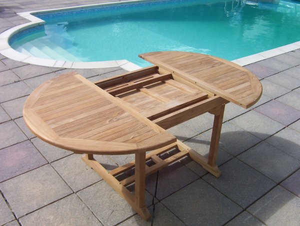 folding extension leaf detail on 120cm teak extending dining table