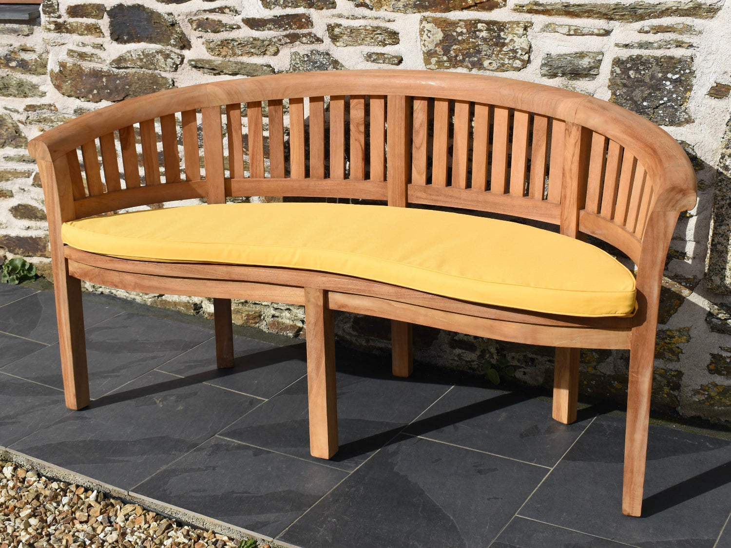 yellow outdoor cushion for curved banana garden bench with removable, machine washable covers