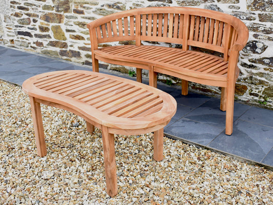 Traditional teak curved banana style bench with matching curved teak garden coffee table