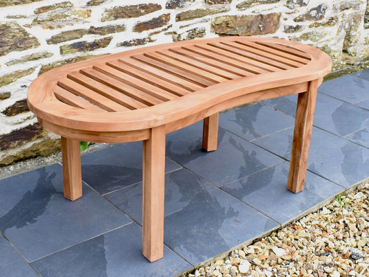 Classic teak garden coffee table to match a traditional style curved banana bench.