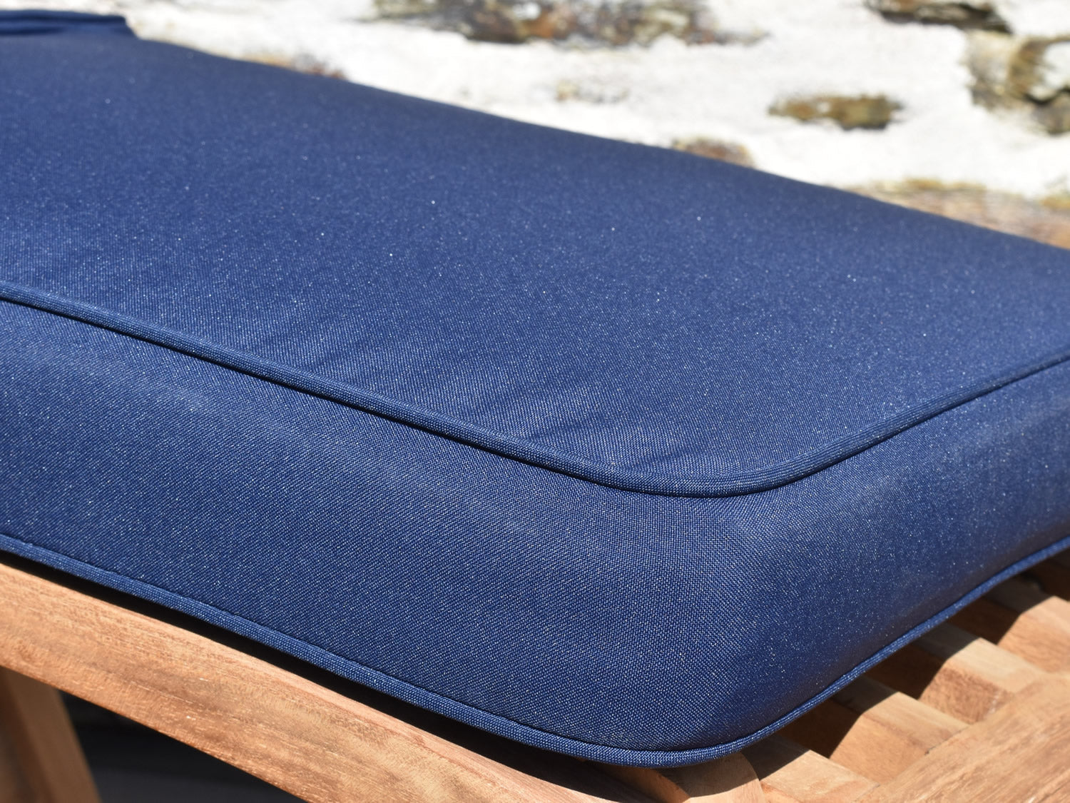 Close up fabric detail of blue steamer chair cushion