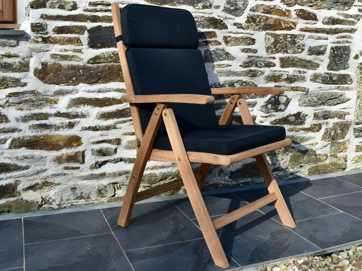 Black colour outdoor cushion for a garden recliner chair