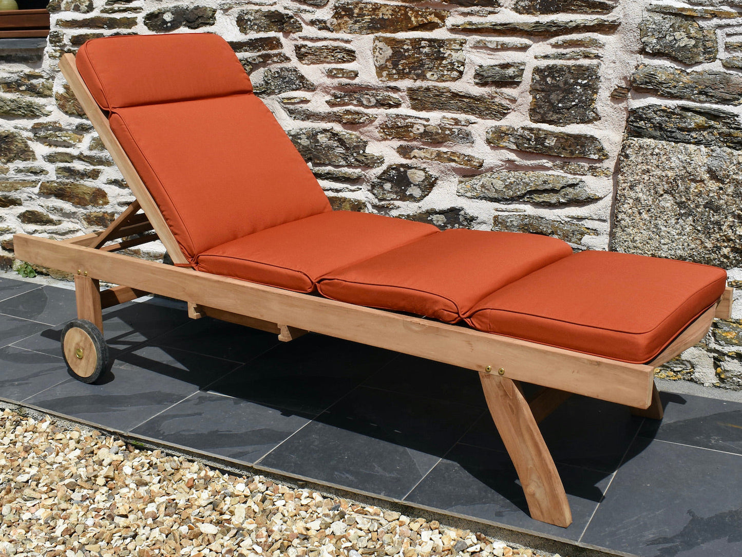 classic terracotta orange colour outdoor cushion for a traditional garden sun lounger chair