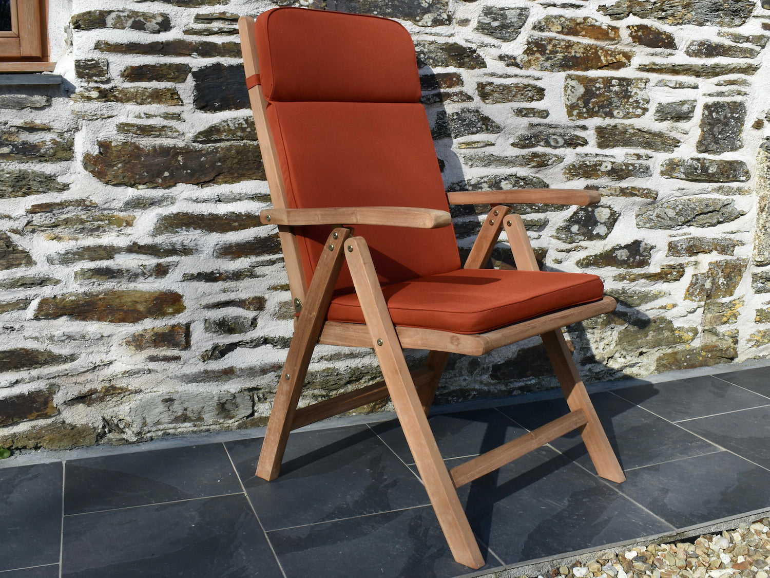 terracotta orange colour outdoor cushion for a garden recliner chair
