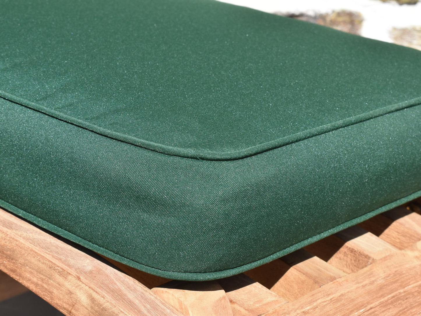 close up detail of classic garden steamer chair fabric in green
