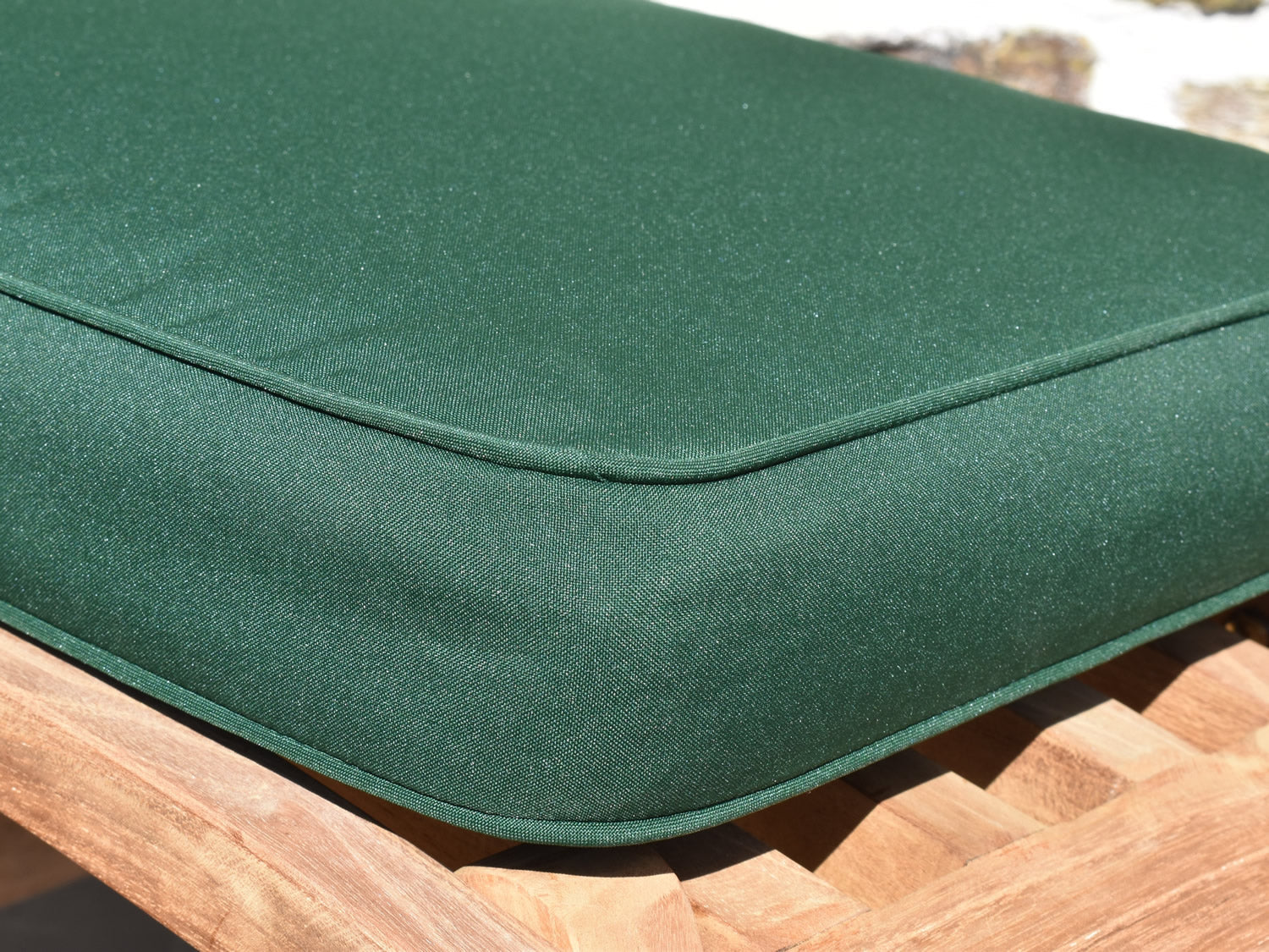 close up detail of classic garden steamer chair fabric in green
