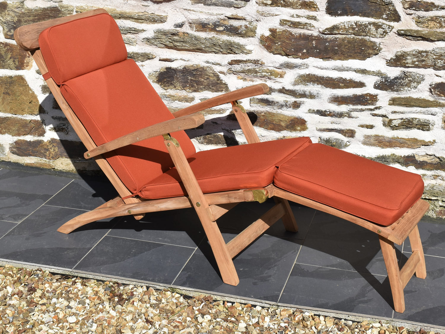 traditional outdoor seamer recliner chair cushion in terracotta orange colour