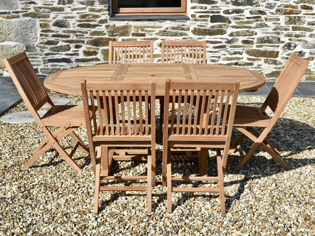 circular extending teak garden dining set with folding chairs - side view
