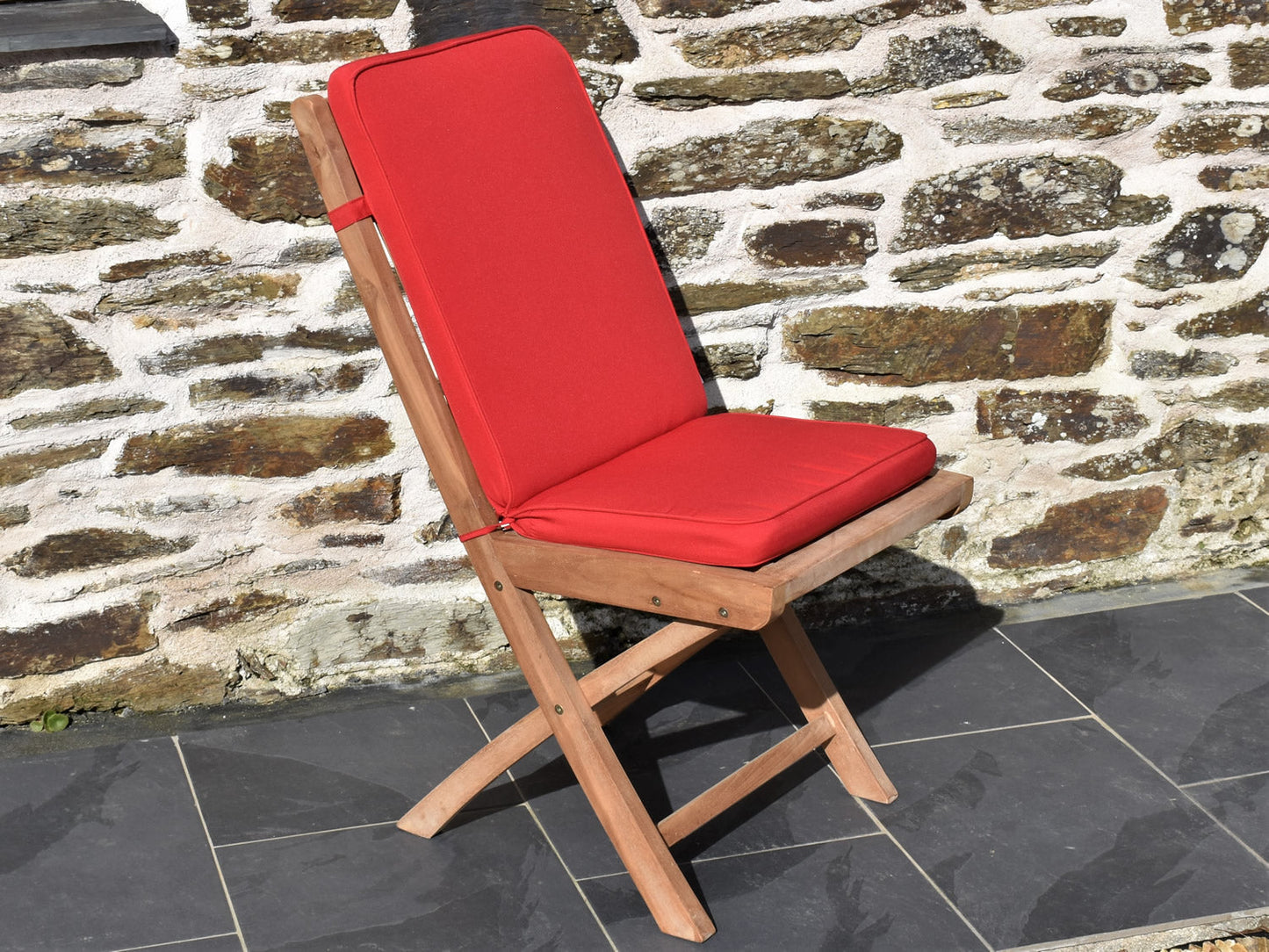 Classic bright red outdoor folding seat pad and back cushion, perfect for folding teak garden chairs
