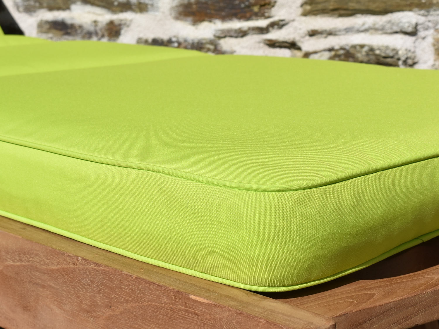 close-up detail light green garden sunlounger fabric