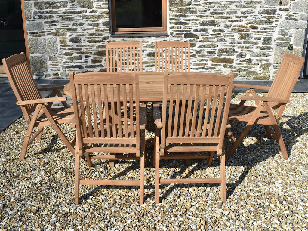 teak garden dining set with 120cm extending garden table and six reclining garden armchairs - side view