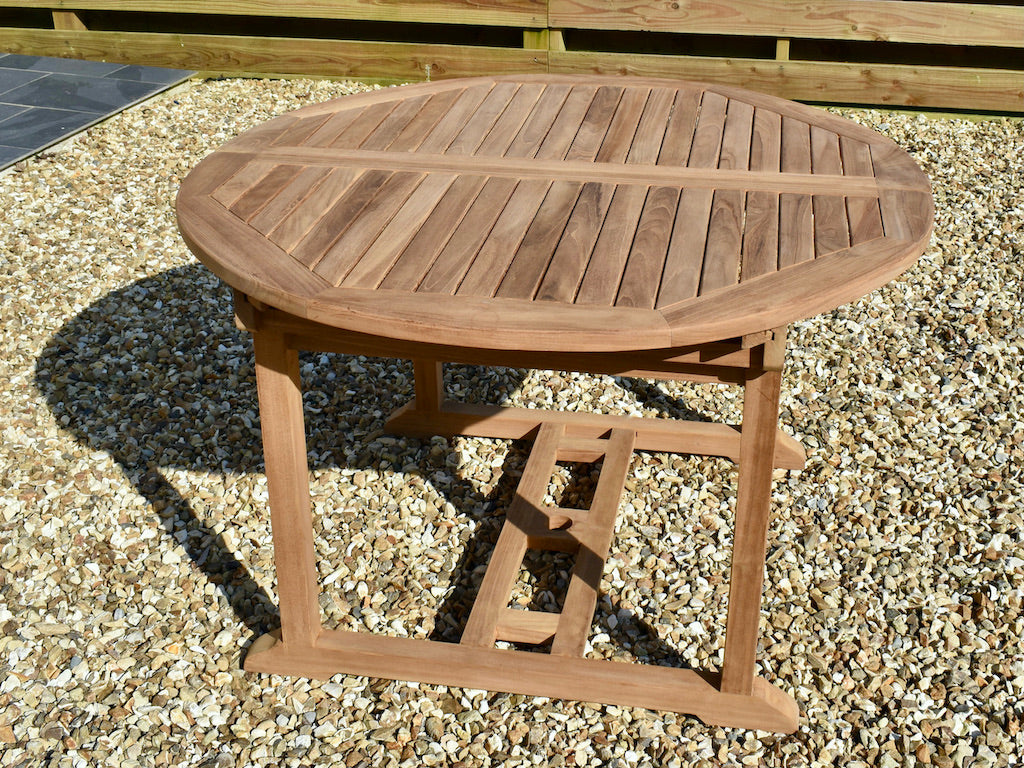 teak circular 120cm teak extending garden dining table, closed view
